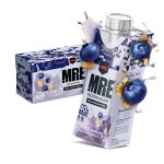 MRE protein shake carton with blueberries and a box in the background on a white background